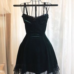 Deep green velvet dress